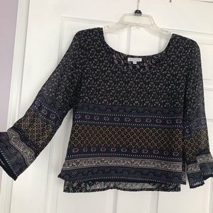 Flowy blouse with back cut out